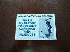 Vintage Canadian Fisherman Kills Baby Seals Postcard picture