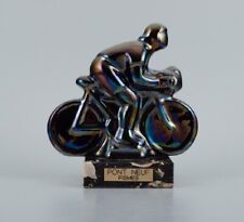 Rambervillers, French ceramic sculpture in the form of a cyclist. picture