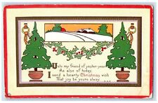 c1910's Christmas Arts Crafts Pine Trees Holly Berries Embossed Antique Postcard picture