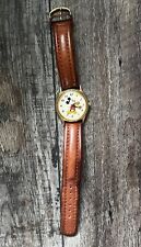 Vintage and Rare Disney watch with light brown band and moveable Mickey Mouse picture