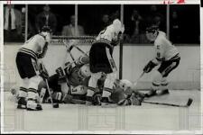 1985 Press Photo Hockey players pile up at Syracuse Invitational Tournament. picture