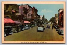 Main Street St. Thomas Ontario Canada Old Cars Shoe Store c1940 Postcard picture