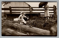 Postcard RPPC Women on the Farm Bucket Log Crossing Umbrella Unposted 1904-1918 picture