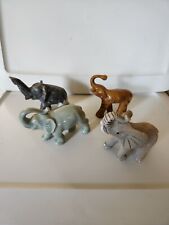 Lot Of 4 Unique Elephant Figurines picture