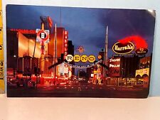 Vintage The Famous Reno Arch & View Virginia St Reno NV Sierra News Co Postcard picture