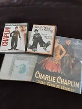 Charlie Chaplin - 2 DVD's w/ Collector Cards Set and Soft Cover Poster Book picture