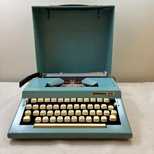 RARE 1980's Turquoise OMEGA 30 portable TYPEWRITER with case BLUE color WORKS picture