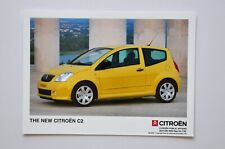 Car Press Photo - 2003 Citroen C2 - Yellow - Front / Side View picture