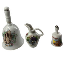 Lot of 3 Vintage Porcelain Bells Praying Hands Bahamas & 1 Mini Floral Jug picture