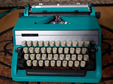 Beautifull turqiose Triumph portable vintage typewriter with case picture