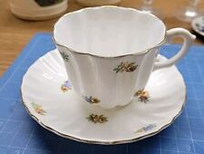 Vintage Staffordshire Crown Bone China Blue Gold cup Saucer set picture