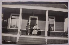 RPPC Couple on Porch Woman with Cat Real Photo Postcard Vintage picture