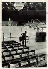 1970 Press Photo Worker setting up chairs at Independence Arena - lra68500 picture