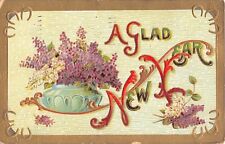 1913 New Year Postcard of Horseshoes & a Vase Filled with Lovely Lilacs-No. 218 picture