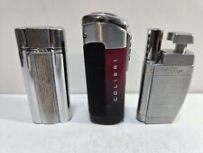 LOT OF 3  VINTAGE COLIBRI LIGHTERS     collect   / display   6995/8 picture
