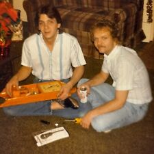 1X Photograph Handsome Cute Gay Interest Couple Fixing Clock Together 1985 picture
