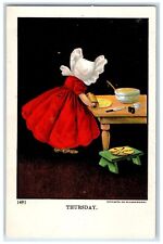 c1910's Thrusday Girl Dress Red Bonnet Baking Pie Ullman Antique Postcard picture