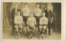 Handsome young men athletes basketball team in uniforms antique sport photo picture