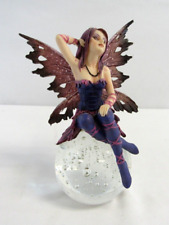 Woodland Fairy Sitting on Bubbled Crystal Ball Butterfly Wings Purple Dress picture