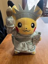 NYC Pokemon Center Pikachu Around the World Statue of Liberty Plush Doll 8 ½ In. picture