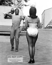 JIM BROWN DOLLY READ TOSS FOOTBALL ON SET 