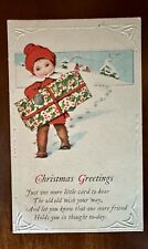 Vintage Christmas Greeting Card Embossed Little Boy Holding Gift 1924 Post H25 picture