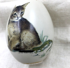 Vintage collectible Eggzakly Inc. porcelain egg with cat Tabby Cat and Lizard picture