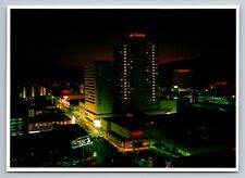 Harrah's Hotel And Casino At Night Reno Nevada Vintage Unposted Postcard picture