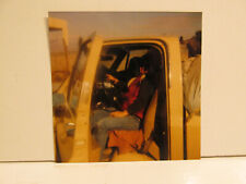 1980S VINTAGE FOUND PHOTOGRAPH COLOR ART OLD PHOTO WOMAN PACKED YELLOW TRUCK PIC picture
