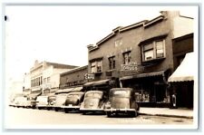 c1940's Cafe Drug Grocery Store Street Scene Ludington MI RPPC Photo Postcard picture