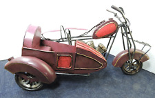 Handcrafted metal motorcycle with side car this is vintage unique picture