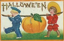 Halloween Postcard~Antique~Two Boys Carrying Giant Pumpkin~B Wall~c1908 picture