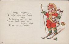 Christmas Child Skier Skiing Carrying Packages Gifts c1920s postcard JQ8 picture