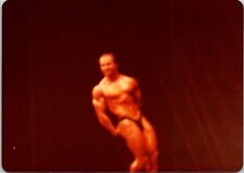 Male Bodybuilder posing Authentic Original FOUND Vintage Photo 20035 Blurry picture