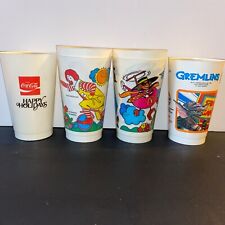 6 Vintage Plastic Cups 4 McDonald’s 1 Gulf/7up Gremlins  1 Coca Cola Santa 1980s picture
