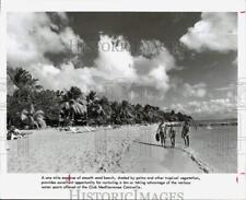1979 Press Photo People walk along beach in Guadeloupe - hpw05380 picture