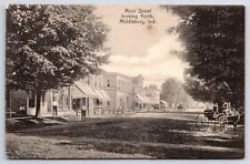 Middlebury Indiana~Dirt Main St~Grocery & Bakery~Hitching Posts~Horse & Buggies picture