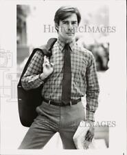 1981 Press Photo Burgundy & Blue shirt from Henry Grethel's Equipment collection picture