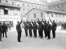 French policemen holding their batons above their heads during tra- 1930s Photo picture