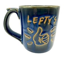 Lefty’s Left Handed Pottery Coffee Mug Cup Novelty Prank Hole Blue Drip Glaze picture