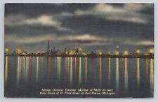 Sarnia Ontario Canada Skyline at night Michigan Linen Postcard No 4753 picture