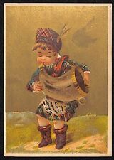 Demorest's Illustrated Magazine Victorian Trade Card Boy in Costume Blows Horn picture