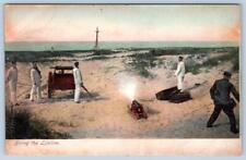 Pre-1907 FIRING THE LIFELINE LIFE SAVING LIFEGUARDS SAILORS BEACH SCENE POSTCARD picture