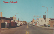 Postcard Craig, CO Street View Colorado Texaco Motel Bank AAA Auto early 1970's picture