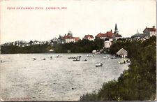 c1907 Ladysmith WI, Flambeau River scene, rowboats, church spire, shoreline picture