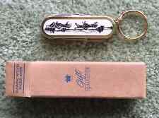 Vintage Avon Running Wolves Pocket Knife Keychain With 4 Tools, 1999 picture