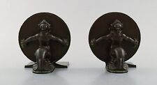 Just Andersen, Denmark. Two rare book stands in disko metal with sea men. 1940's picture