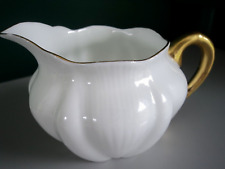 ANTIQUE  SHELLEY ENGLAND RIBBED SHELL LIKE WHITE PORCELAIN W GOLD SMALL CREAMER picture