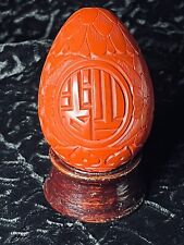 Vintage Carved Cinnabar Egg w/stand picture