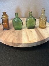 Four Vintage Glass Bottles                       2 Green 2 Amber = 4 Total picture